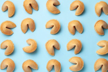 Çin şans kurabiyeleri. Sözcük tahmini için boş boş olan tanımlama bilgileri doku deseni. Mavi arka plan.