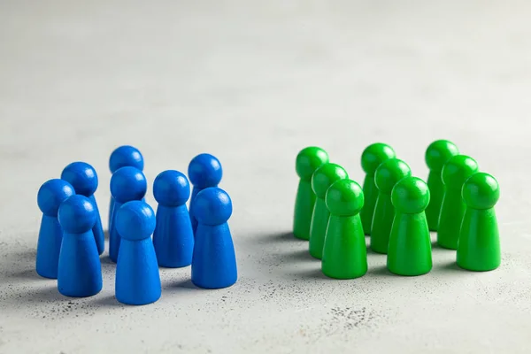 Two business teams. One group of built-up staff and the other scattered and stand randomly. — Stock Photo, Image