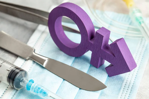 Sex-change operation. Transgender symbol and scalpel with a syringe. Surgical Instruments — Stock Photo, Image