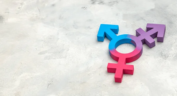 Transgender symbol a symbol pohlaví muže a ženy na šedém pozadí — Stock fotografie