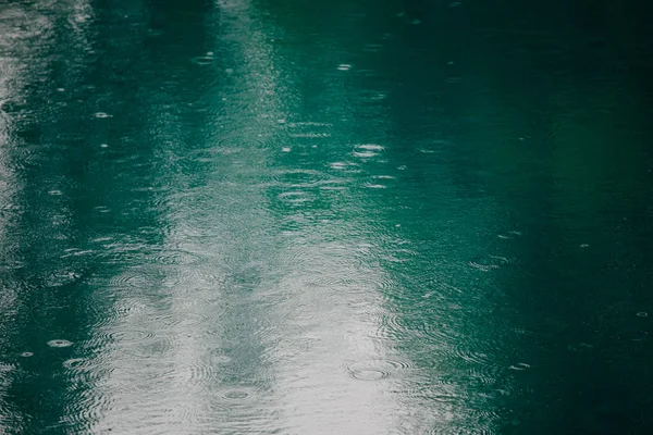 natural mineral spring in the rain