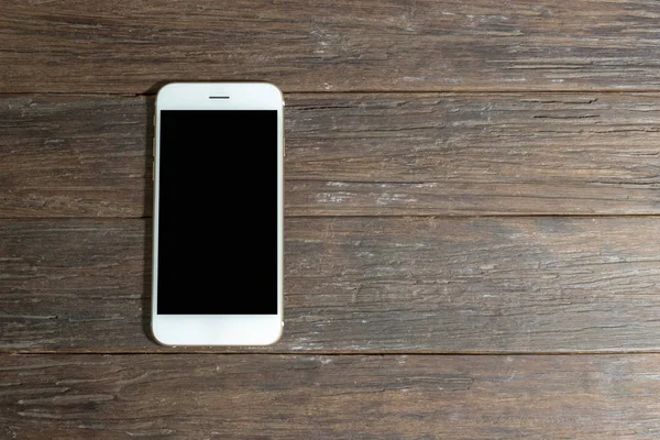 boş smartphone ya da tablet ahşap masa üzerinde