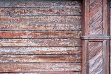 Eski bir ev duvar kahverengi boya izleri ile ahşap arka plan