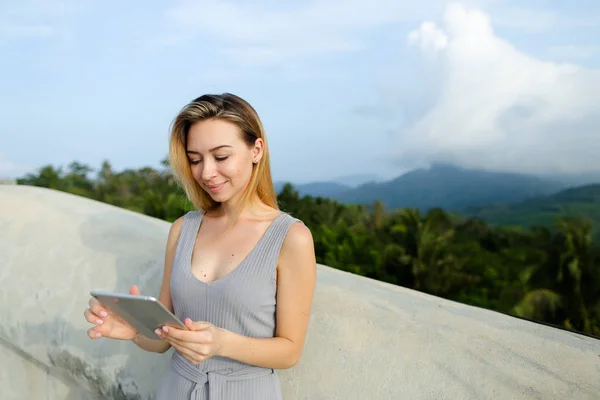 Young Nice Girl Using Modern Tablet Mountains Background — Stock Photo, Image