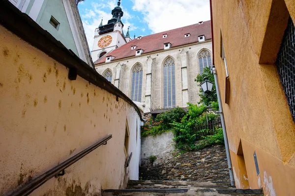 Historical attractions in Austria with red tiled roofs.