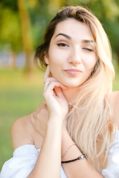 Portrait of young nice female person, green background. — Stock Photo, Image