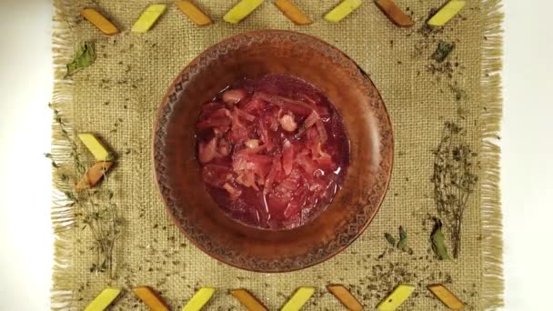 Borsch with parsley top view. Vegetable soup and sour cream stop motion animation — Stock Footage Borsch Parsley Top View Vegetable Soup Sour Cream Stop Motion Stock Video