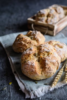 Savory Irish soda bread with Roquefort cheese, pumpkin seeds and flax seeds clipart