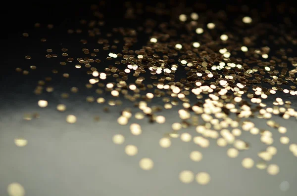 Gold sparkles glitter. Glitter glow festive sparkles design.