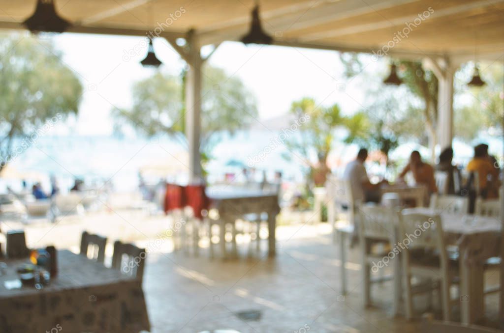 Blurred of Beachfront restaurant. Holiday season. - Image