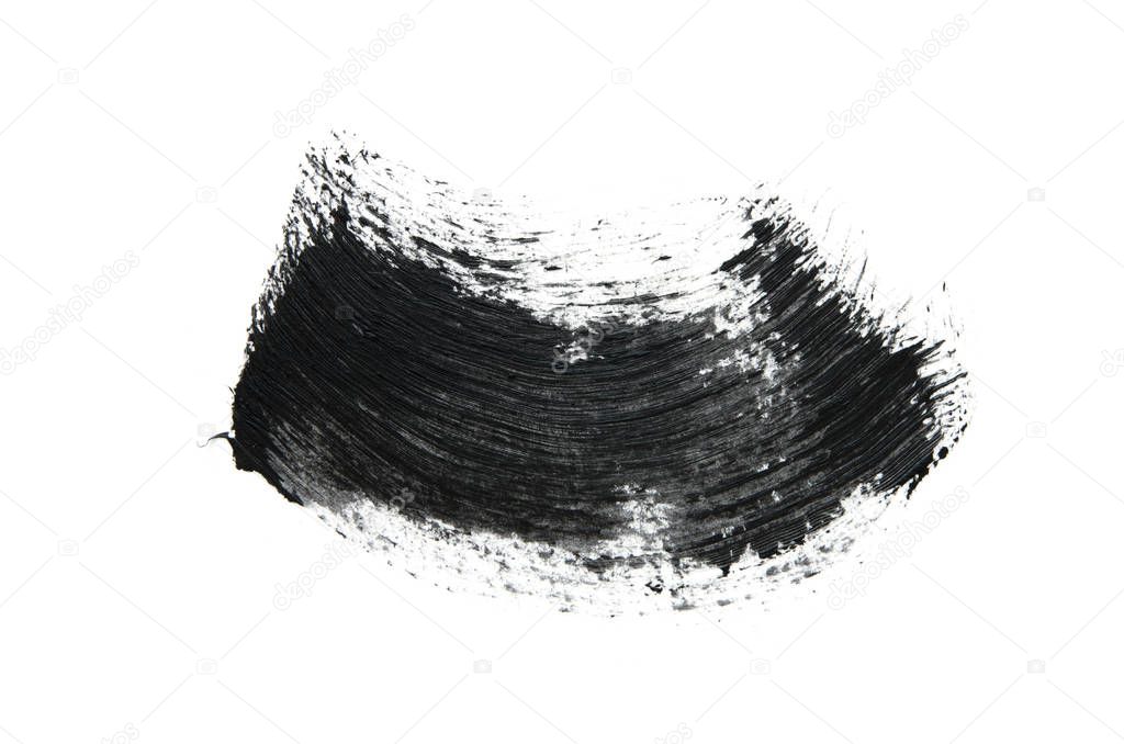 Black mascara brush strokes isolated on white. - Image