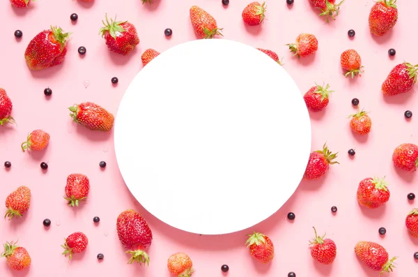 Creative layout of strawberry and blueberry with space for text on white paper. Mockup. View from above. - Image