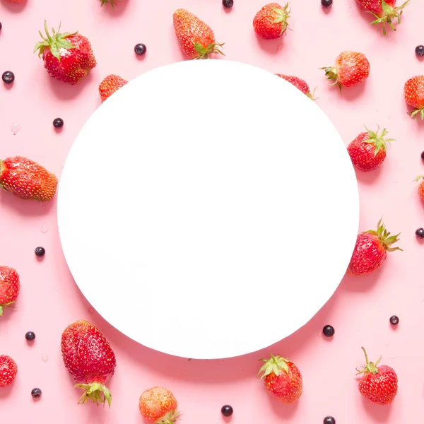 Creative layout of strawberry and blueberry with space for text on white paper. Mockup. View from above. - Image