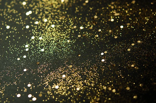 金色闪耀在黑色背景上 节日理念 — 图库照片