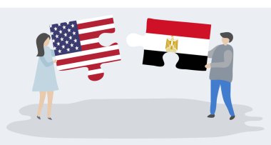 Amerikan ve Mısır bayrakları ile iki bulmaca parçaları tutan çift. Amerika Birleşik Devletleri ve Mısır ulusal sembolleri birlikte.