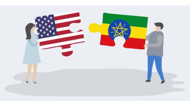 Amerikan ve Etiyopya bayrakları ile iki bulmaca parçaları tutan çift. Amerika Birleşik Devletleri ve Etiyopya ulusal sembolleri birlikte.