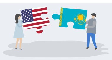 Amerikan ve Kazak bayrakları ile iki bulmaca parçaları tutan çift. Amerika Birleşik Devletleri ve Kazakistan ulusal sembolleri birlikte.