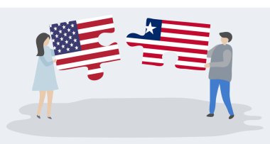 Amerikan ve Liberya bayrakları ile iki bulmaca parçaları tutan çift. Amerika Birleşik Devletleri ve Liberya ulusal sembolleri birlikte.