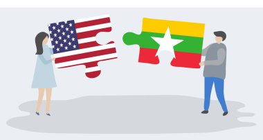 Amerikan ve Birmanya bayrakları ile iki bulmaca parçaları tutan çift. Amerika Birleşik Devletleri ve Myanmar ulusal sembolleri birlikte.