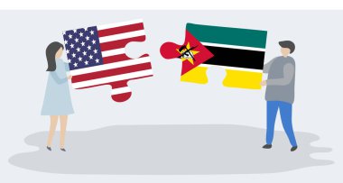 Amerikan ve Mozambik bayrakları ile iki bulmaca parçaları tutan çift. Amerika Birleşik Devletleri ve Mozambik ulusal sembolleri birlikte.
