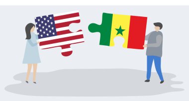 Amerikan ve Senegal bayrakları ile iki bulmaca parçaları tutan çift. Amerika Birleşik Devletleri ve Senegal ulusal sembolleri birlikte.