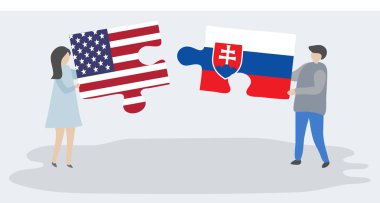 Amerikan ve Slovak bayrakları ile iki bulmaca parçaları tutan çift. Amerika Birleşik Devletleri ve Slovakya ulusal sembolleri birlikte.