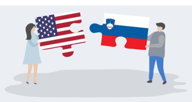 Amerikan ve Sloven bayrakları ile iki bulmaca parçaları tutan çift. Amerika Birleşik Devletleri ve Slovenya ulusal sembolleri birlikte.
