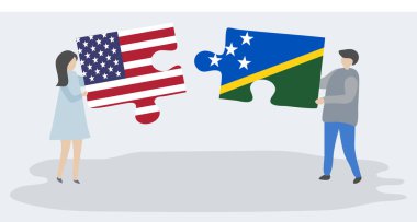 Amerikan ve Solomon Adası bayrakları ile iki bulmaca parçaları tutan çift. Amerika Birleşik Devletleri ve Solomon Adaları ulusal sembolleri birlikte.