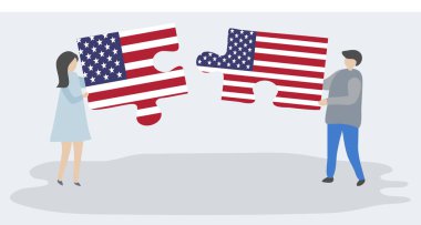 Amerikan ve Amerikan bayrakları ile iki bulmaca parçaları tutan çift. Amerika Birleşik Devletleri ve Amerika Birleşik Devletleri ulusal sembolleri birlikte.