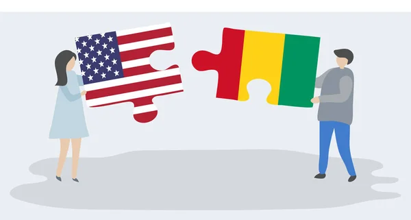 Пара Держащая Две Головоломки Американскими Гвинейскими Флагами Соединённые Штаты Америки — стоковый вектор