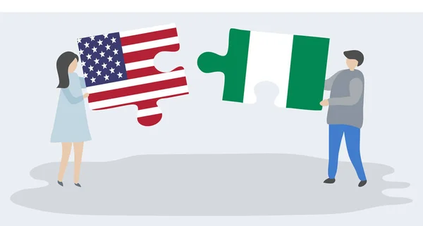 Pareja Sosteniendo Dos Piezas Rompecabezas Con Banderas Americanas Nigerianas Estados — Vector de stock