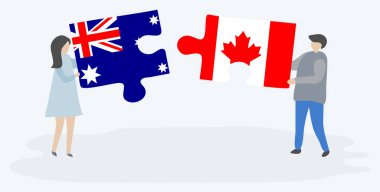 Avustralya ve Kanada bayrakları ile iki bulmaca parçaları tutan çift. Avustralya ve Kanada ulusal sembolleri birlikte.