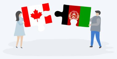 Kanada ve Afgan bayrakları ile iki bulmaca parçaları tutan çift. Kanada ve Afganistan ulusal sembolleri birlikte.