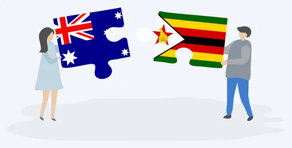 Avustralya Zimbabve Bayrakları Ile Iki Bulmaca Parçaları Tutan Çift Avustralya — Stok Vektör