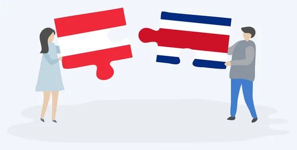 Pareja Sosteniendo Dos Piezas Rompecabezas Con Banderas Austria Costa Rica — Archivo Imágenes Vectoriales