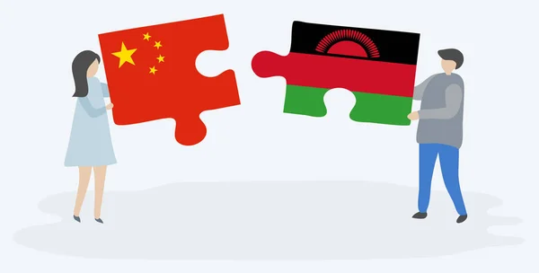 Para Trzyma Dwa Kawałki Puzzli Chińskich Malawian Flagi Chiny Malawi — Wektor stockowy