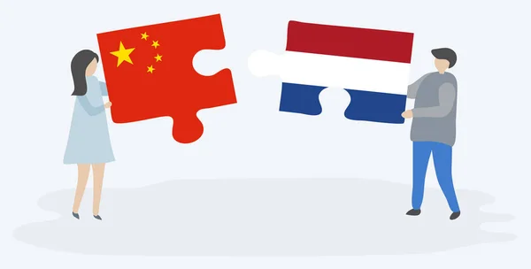 Paar Houden Twee Puzzels Stukken Met Chinese Nederlandse Vlaggen China — Stockvector
