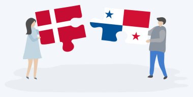 Çift Danimarka ve Panama bayrakları ile iki bulmaca parçaları tutan. Danimarka ve Panama ulusal sembolleri birlikte.