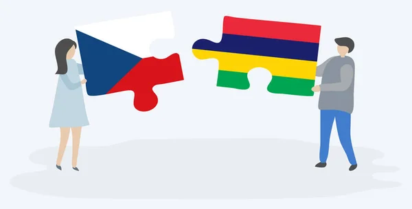 卡通夫妇拿着两个拼图片与捷克和毛里求斯国旗隔离在白色背景 毛里求斯和捷克共和国国家符号在一起 — 图库矢量图片