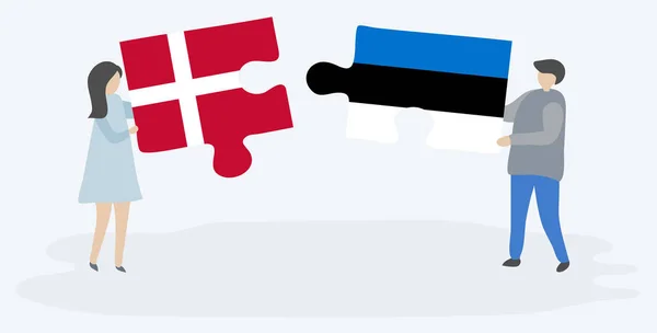 Pareja Dibujos Animados Con Dos Piezas Rompecabezas Con Banderas Danesas — Archivo Imágenes Vectoriales