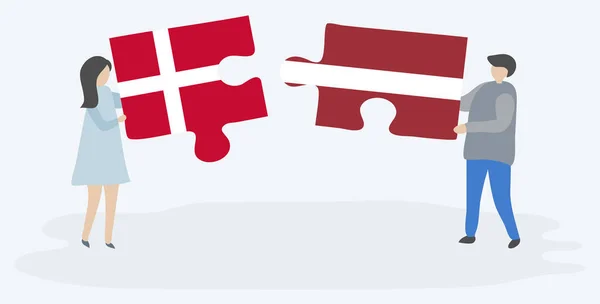 Couple Holding Two Puzzles Pieces Danish Latvian Flags Denmark Latvia — Stock Vector