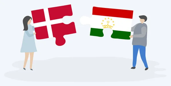 Coppia Contenente Due Pezzi Puzzle Con Bandiere Danesi Tagikistane Danimarca — Vettoriale Stock