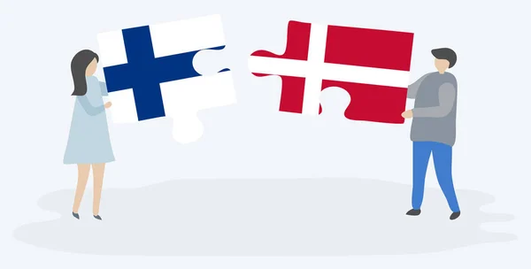 Pareja Sosteniendo Dos Piezas Rompecabezas Con Banderas Finlandesas Danesas Finlandia — Vector de stock