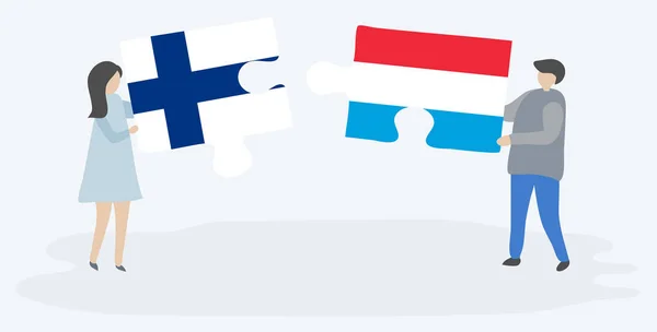 Par Som Innehar Två Pusselbitar Med Finska Och Luxemburgiska Flaggor — Stock vektor