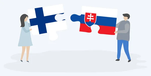 フィンランドとスロバキアの旗を持つ2つのパズルピースを保持しているカップル フィンランドとスロバキアの国のシンボル — ストックベクタ