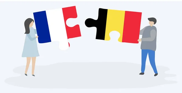 Casal Segurando Duas Peças Quebra Cabeças Com Bandeiras Francesas Belgas — Vetor de Stock
