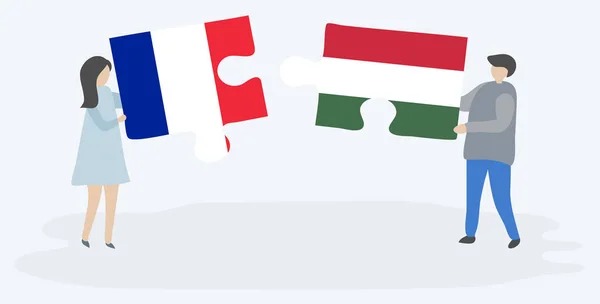 Ζευγάρι Που Κρατά Δύο Κομμάτια Παζλ Γαλλικές Και Ουγγρικές Σημαίες — Διανυσματικό Αρχείο