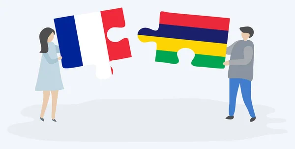 一对夫妇拿着两个拼图 上面挂着法国和毛里求斯国旗 法国和毛里求斯国家符号在一起 — 图库矢量图片