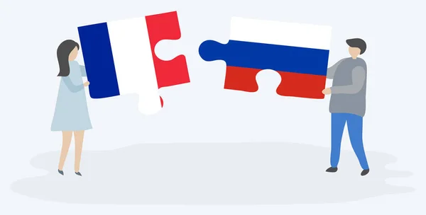 Par Som Innehar Två Pusselbitar Med Franska Och Ryska Flaggor — Stock vektor
