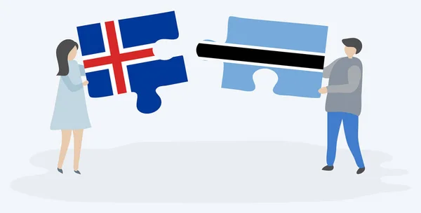 Dvojice Drží Dvě Skládanky Vlajkami Islandských Motswana Národní Symboly Islandu — Stockový vektor